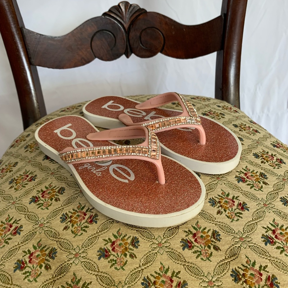 BEBÉ rose gold flip flops